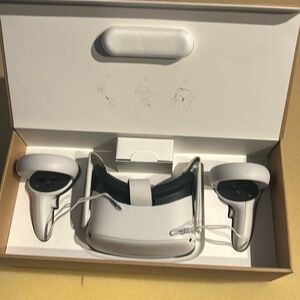 Brand new meta quest 2, it has a couple of games like beat saber, gorilla tag